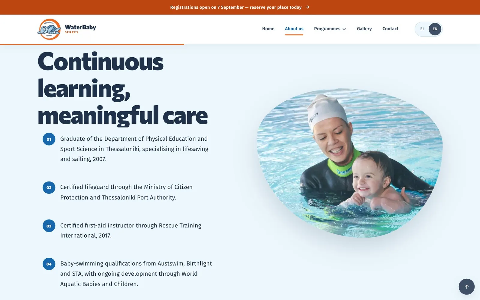The heading “Continuous learning, meaningful care” above four numbered qualifications: a physical-education degree from Thessaloniki in 2007, lifeguard certification, first-aid instructor certification in 2017, and baby-swimming qualifications from Austswim, Birthlight and STA, beside a rounded photograph of a smiling adult in a white swim cap and wetsuit holding a laughing baby in the water.
