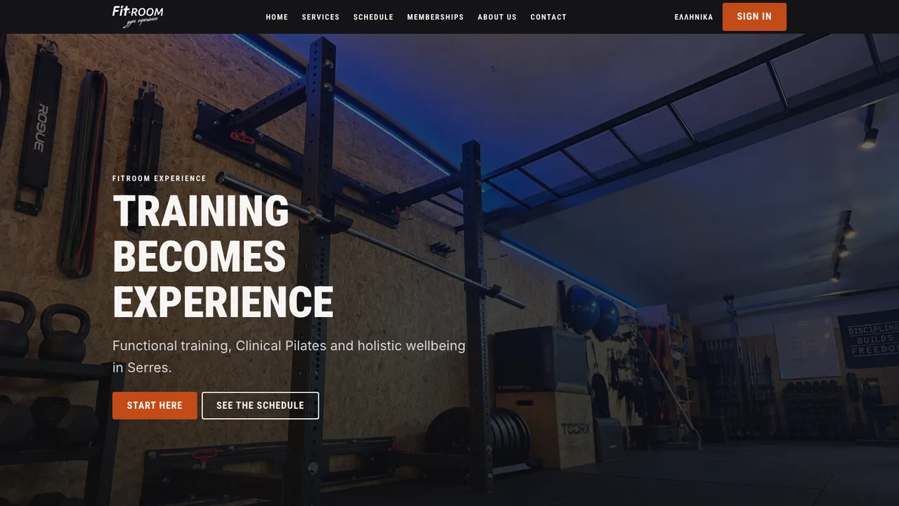 FitRoom Experience homepage: the studio's own photograph behind the headline Training becomes experience