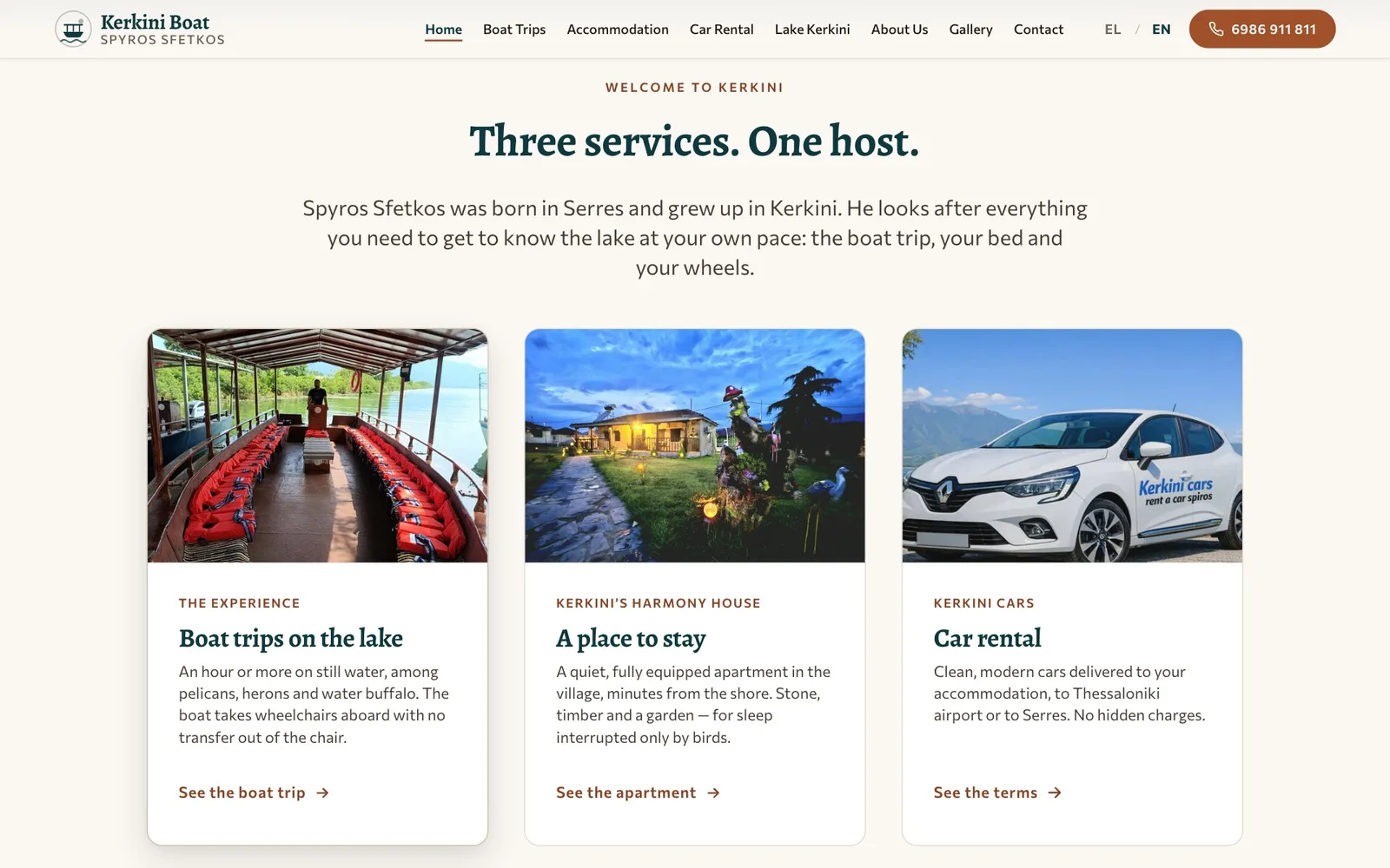 The section "Three services. One host." with a short introduction about Spyros Sfetkos and three cards, the first raised with a shadow under the pointer. Their photographs show the boat's deck with rows of red life jackets under a timber canopy, the guest house at dusk with a lit garden and carved wooden birds, and a white Kerkini Cars hire car in front of mountains; each card has a label, a title — Boat trips on the lake, A place to stay, Car rental — a short description and a link.