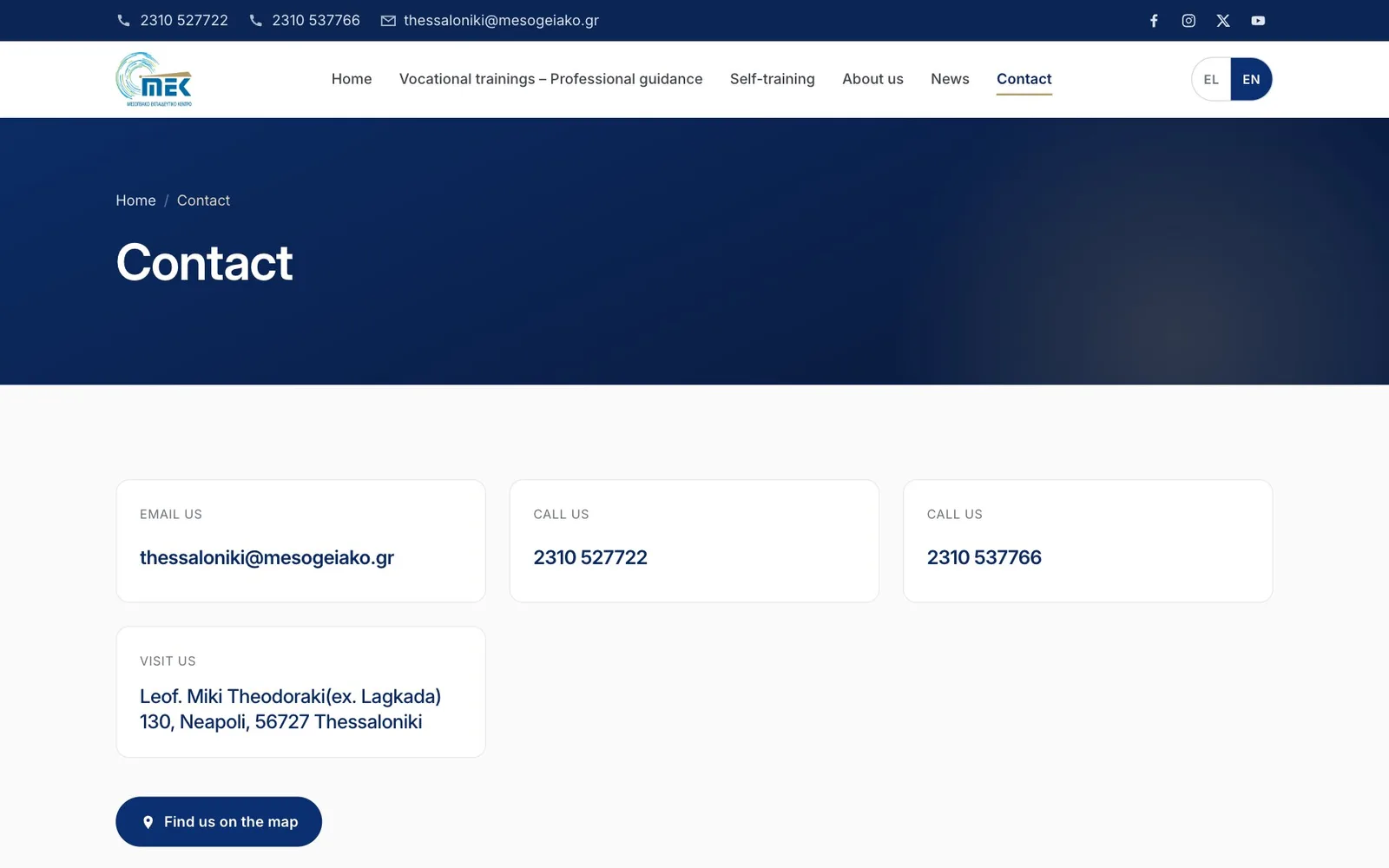 The contact page: a navy header with the breadcrumb Home / Contact and the heading "Contact", then white cards labelled "EMAIL US" with thessaloniki@mesogeiako.gr, two "CALL US" cards with 2310 527722 and 2310 537766, and "VISIT US" with an address in Neapoli, Thessaloniki, above a navy "Find us on the map" button with a pin icon.