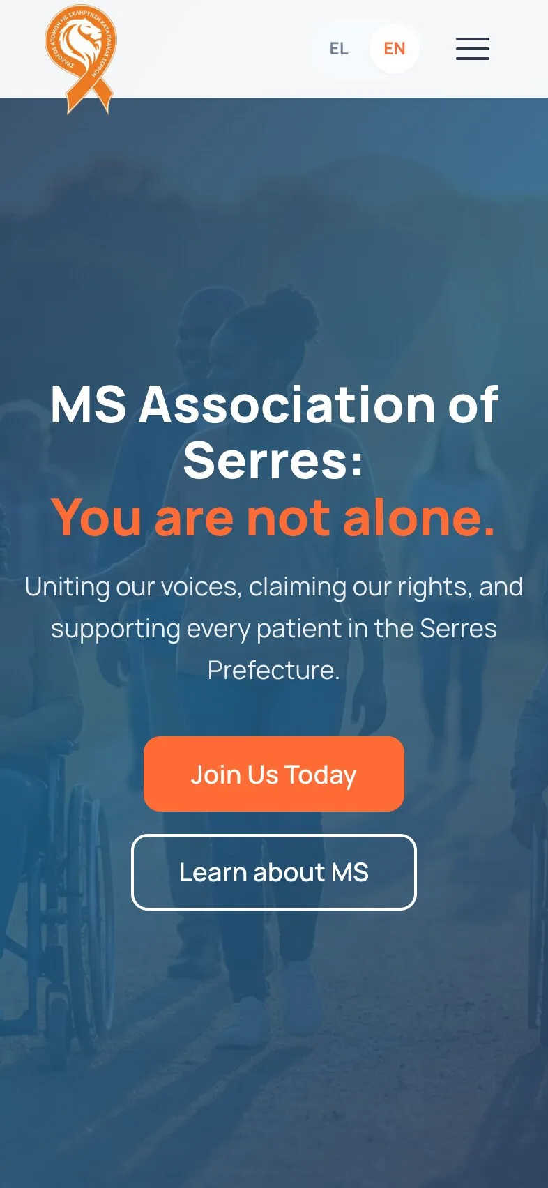 The home page on a phone: the ribbon logo, the EL/EN switch and a menu button, then the headline "MS Association of Serres: You are not alone." over three lines, the supporting line, and the "Join Us Today" and "Learn about MS" buttons stacked, on the blue-tinted photograph of people walking outdoors.